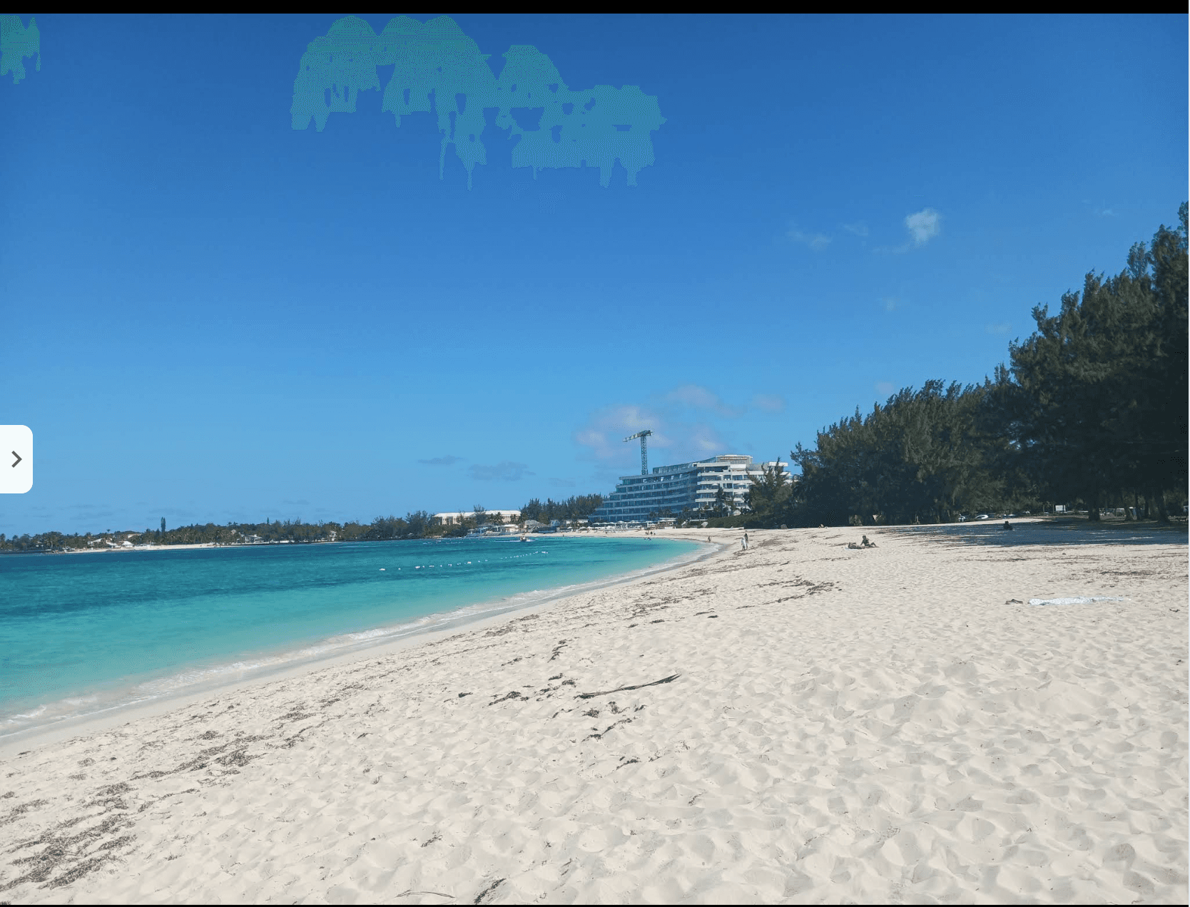 White sand and turquoise water along Goodman’s Bay beach in Nassau