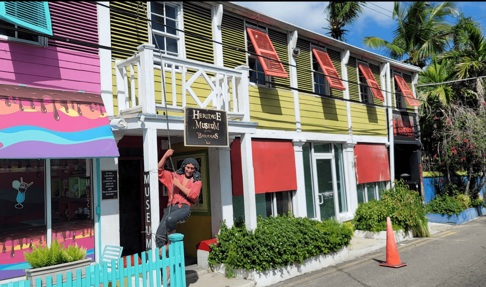 Heritage Museum of The Bahamas sign on a colourful building on West Hill Street