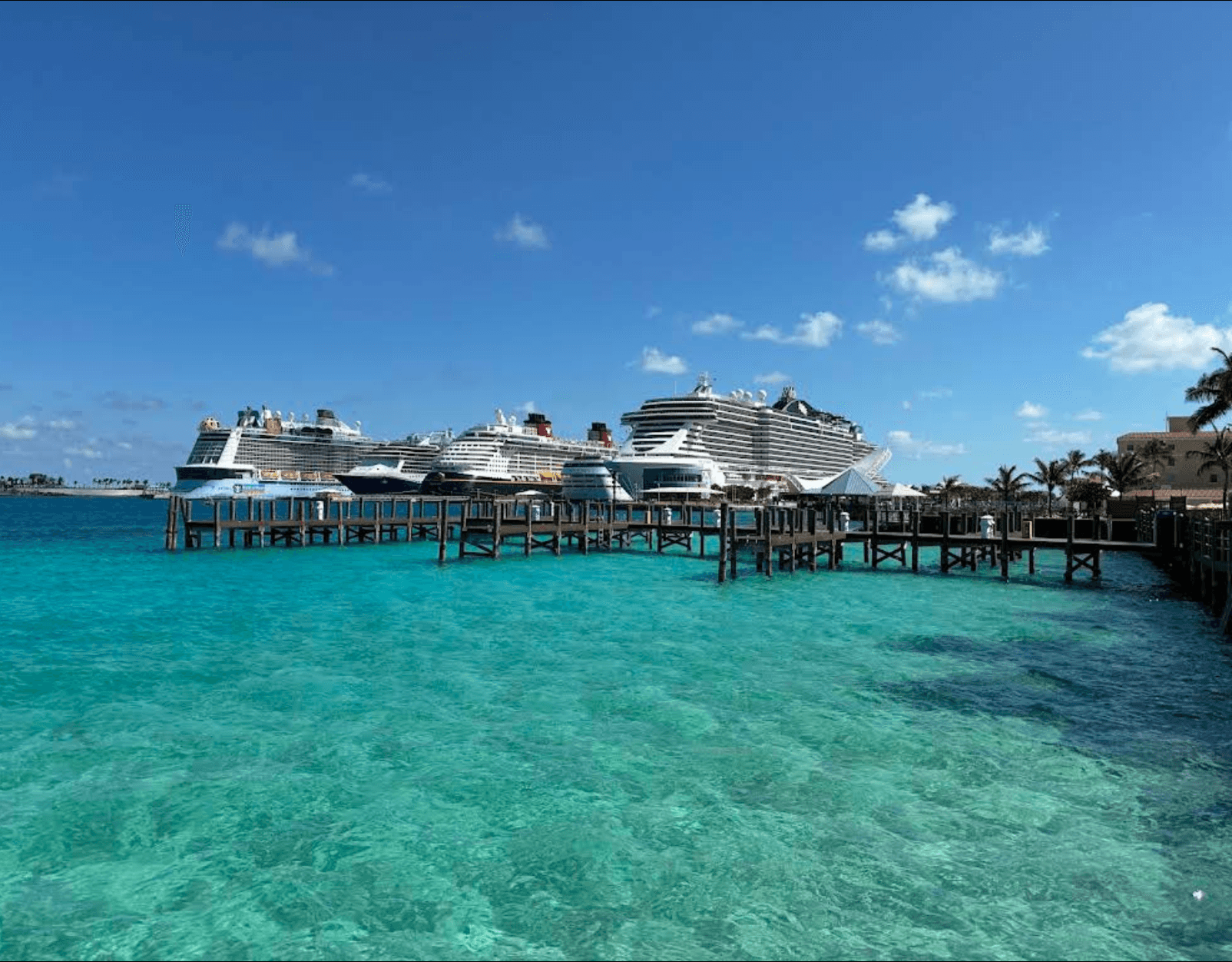 Cruise ships and a wooden pier on the Nassau waterfront