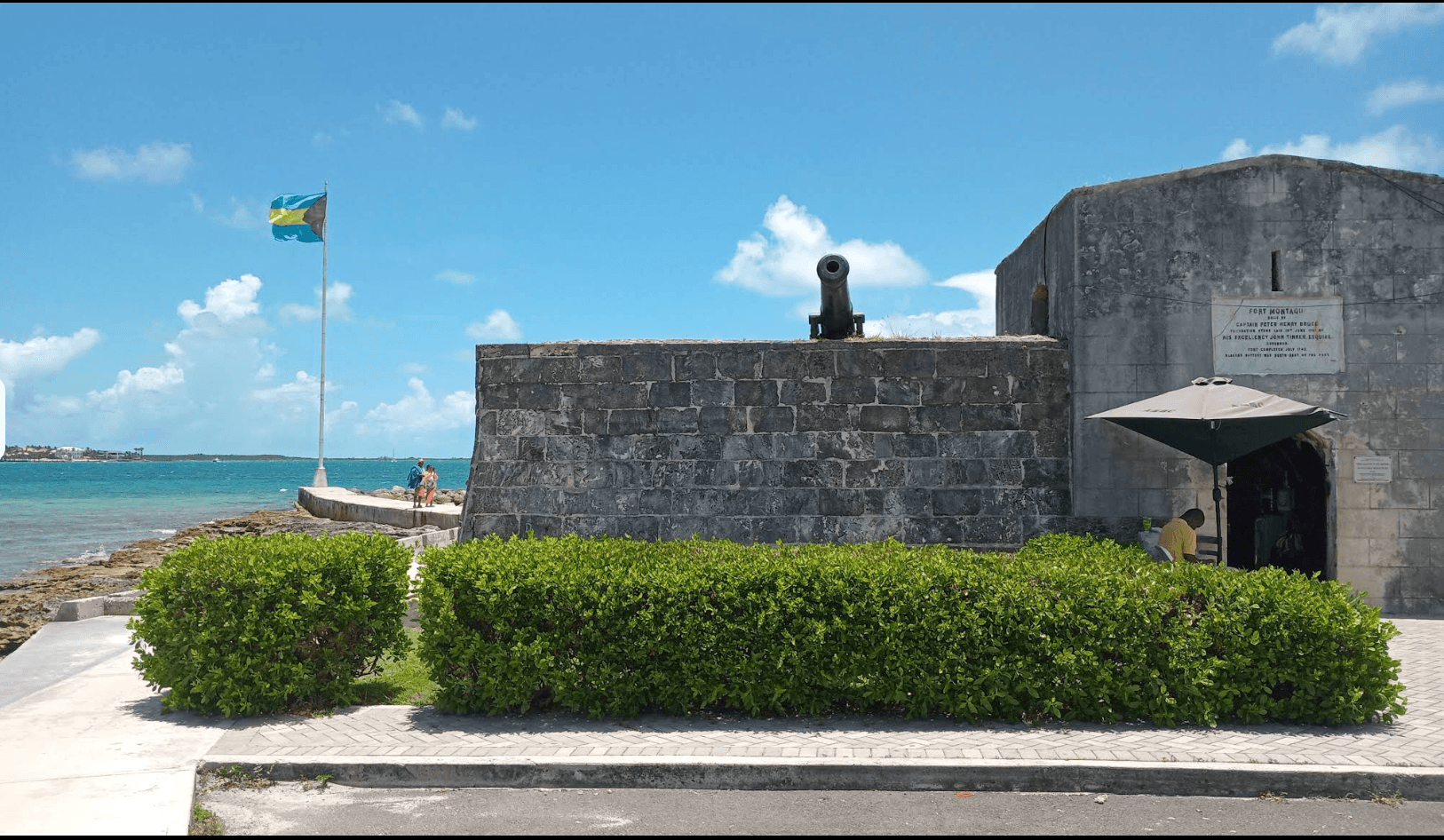 Fort Montagu and the Bahamian flag beside Montagu Beach in Nassau