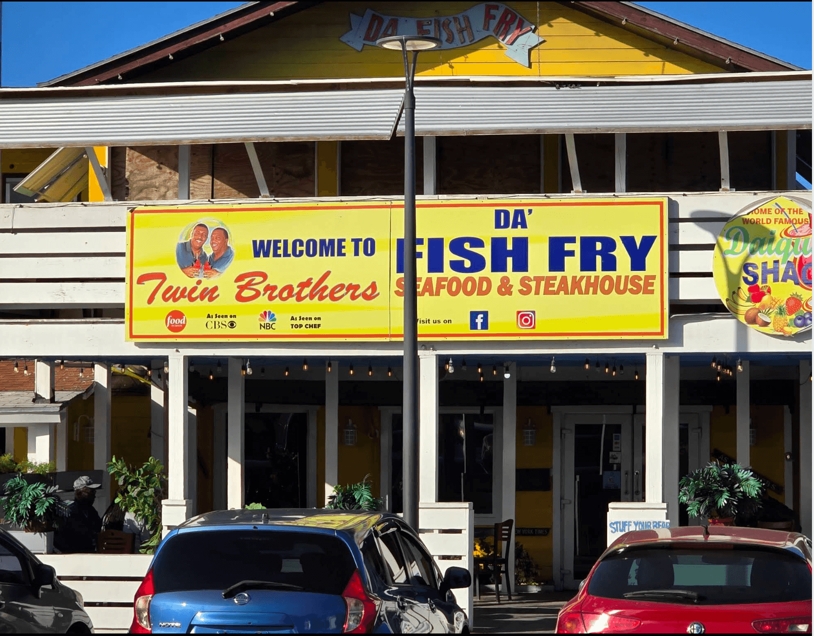 Twin Brothers restaurant exterior with its yellow Fish Fry sign at Arawak Cay