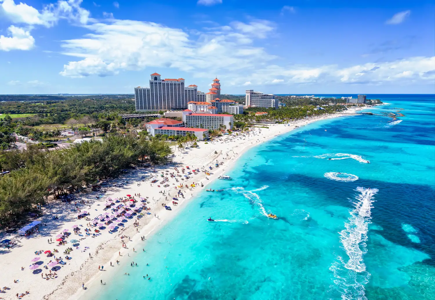 Turquoise water and white sand at a public beach in Nassau, Bahamas